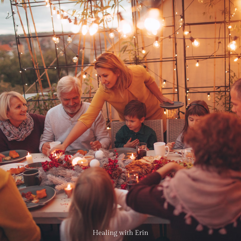 Happy family sharing a meal around the dinner table, representing the social challenges of eating on an elimination diet